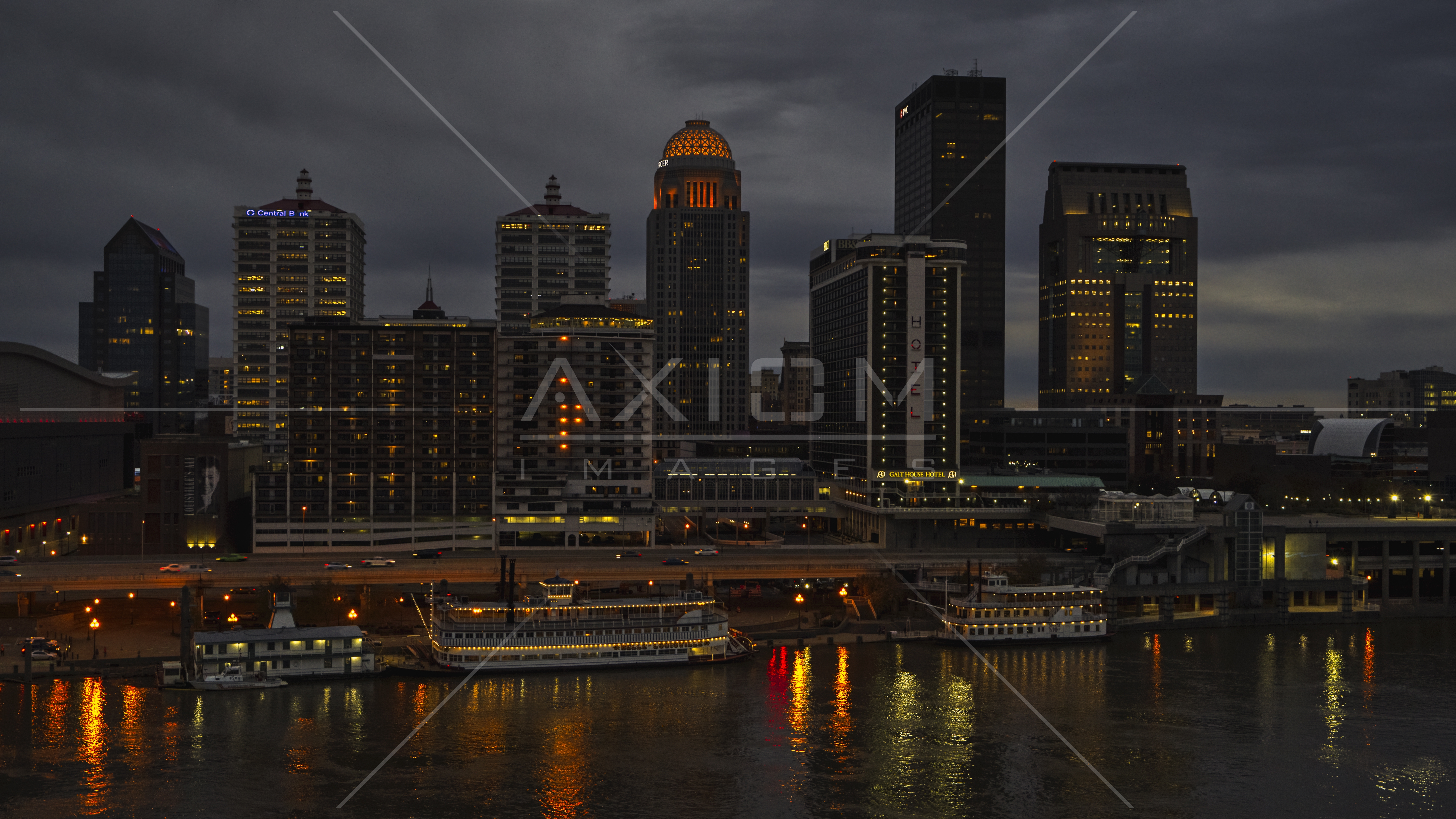 The city skyline of Downtown Louisville, Kentucky at nighttime Aerial