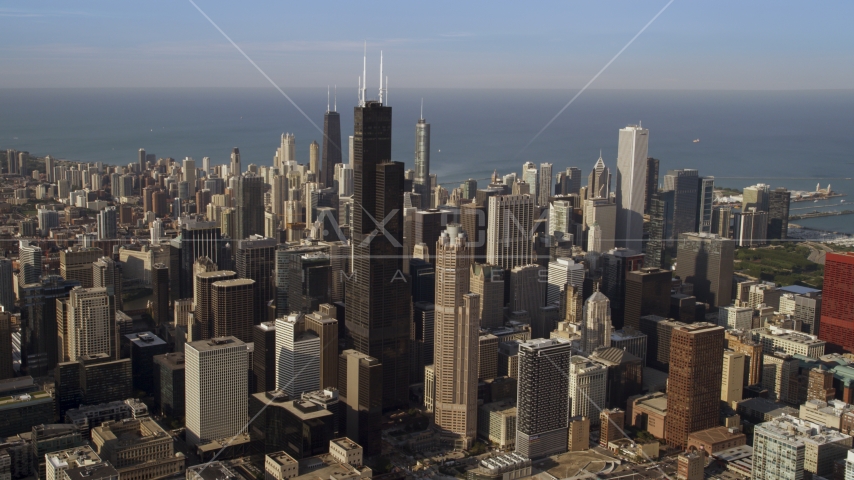 Downtown Chicago cityscape and the iconic Willis Tower skyscraper, Illinois Aerial Stock Photos AX0002_064.0000209F