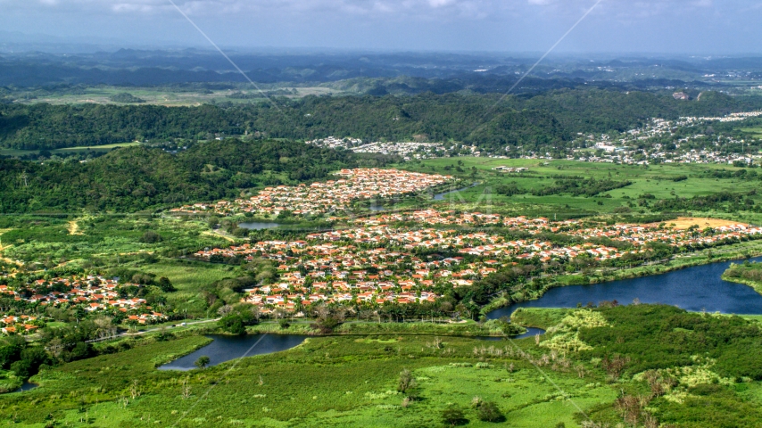 Rural neighborhoods among trees and grassy areas, Dorado, Puerto Rico Aerial Stock Photo AX101_033.0000000F | Axiom Images
