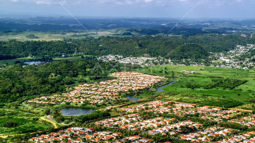 Rural homes among trees and grassy areas, Dorado, Puerto Rico Aerial Stock Photo AX101_033.0000283F | Axiom Images