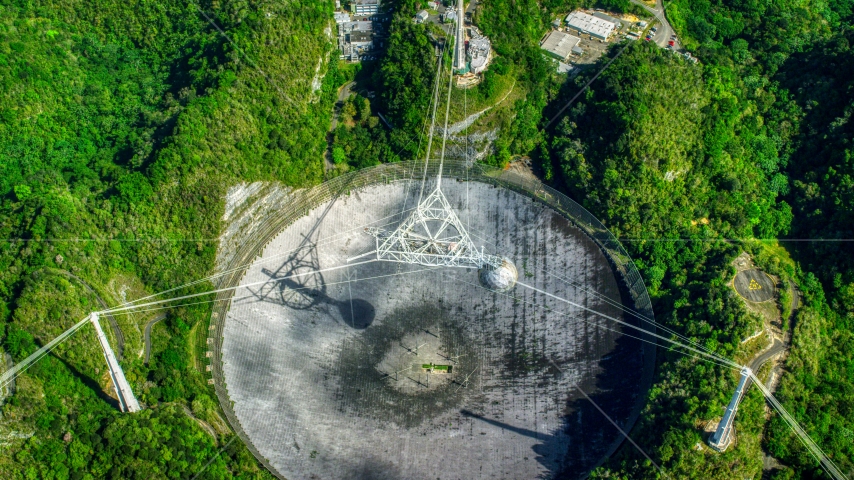Looking down at the Arecibo Observatory dish in Puerto Rico Aerial Stock Photo AX101_122.0000000F | Axiom Images