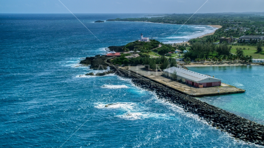 Arecibo Lighthouse and the blue waters of the Caribbean, Puerto Rico Aerial Stock Photo AX101_142.0000000F | Axiom Images