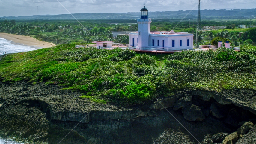 The hilltop Arecibo Lighthouse in Puerto Rico Aerial Stock Photo AX101_149.0000000F | Axiom Images