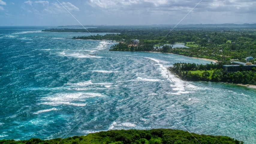 Blue ocean and Caribbean island coastline in Vega Alta, Puerto Rico Aerial Stock Photo AX101_212.0000205F | Axiom Images