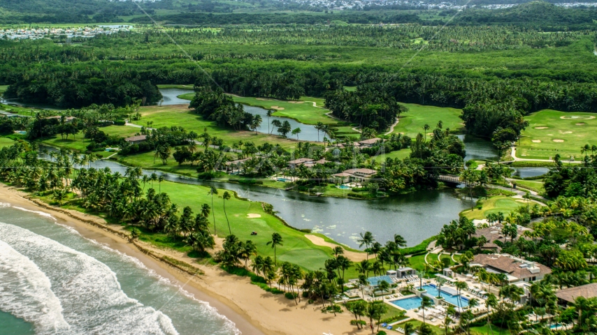 Caribbean beachfront resort in Rio Grande, Puerto Rico Aerial Stock Photo AX102_040.0000127F | Axiom Images
