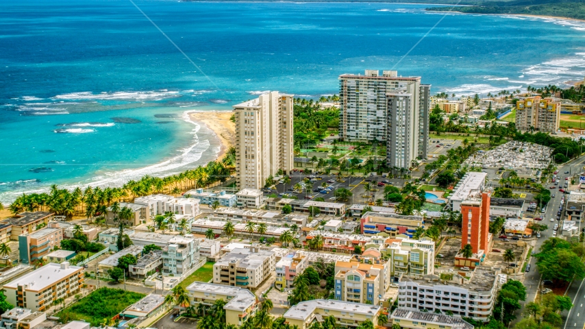 Beachfront condominium complexes in Luquillo, Puerto Rico Aerial Stock Photo AX102_050.0000000F | Axiom Images