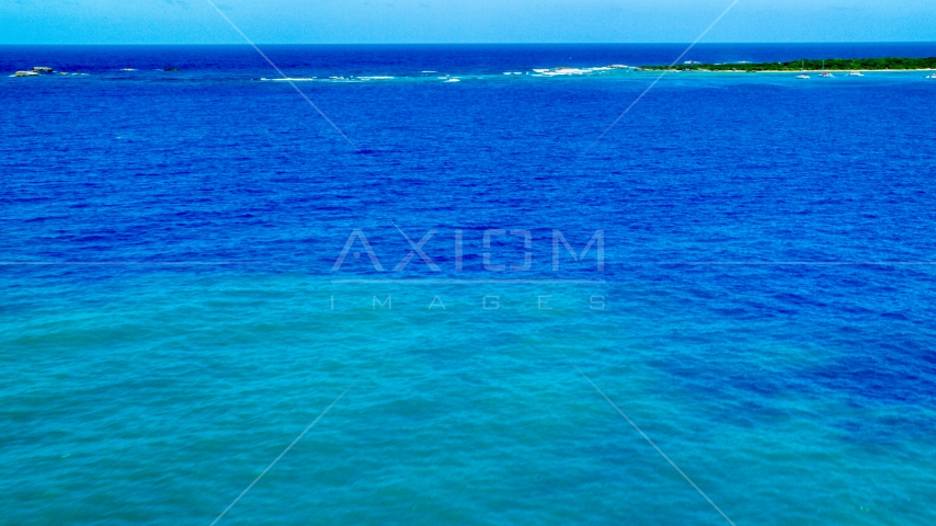 Crystal clear blue Caribbean waters and tiny islands, Rada Fajardo, Puerto Rico Aerial Stock Photo AX102_072.0000181F | Axiom Images