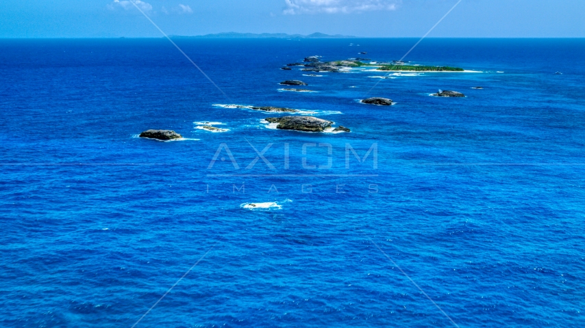 Tiny Caribbean islands in tropical blue waters, Puerto Rico Aerial Stock Photo AX102_087.0000074F | Axiom Images
