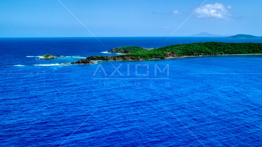 Rugged Caribbean island coastline in sapphire blue water, Culebra, Puerto Rico Aerial Stock Photo AX102_107.0000000F | Axiom Images