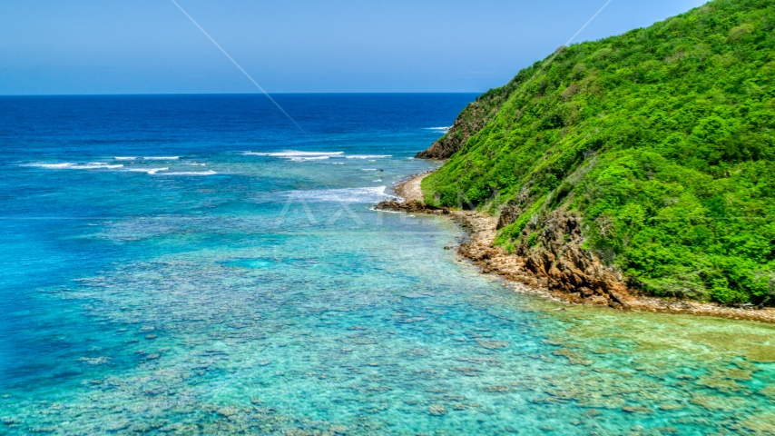 Reefs in sapphire blue waters and a rugged coastline, Culebra, Puerto Rico Aerial Stock Photo AX102_114.0000000F | Axiom Images