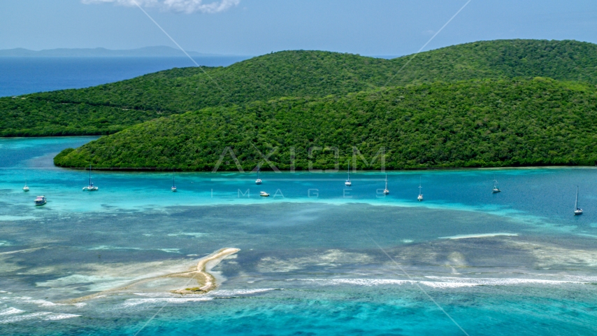 Sailboats in turquoise waters beside a Caribbean island coast, Culebra, Puerto Rico Aerial Stock Photo AX102_140.0000148F | Axiom Images