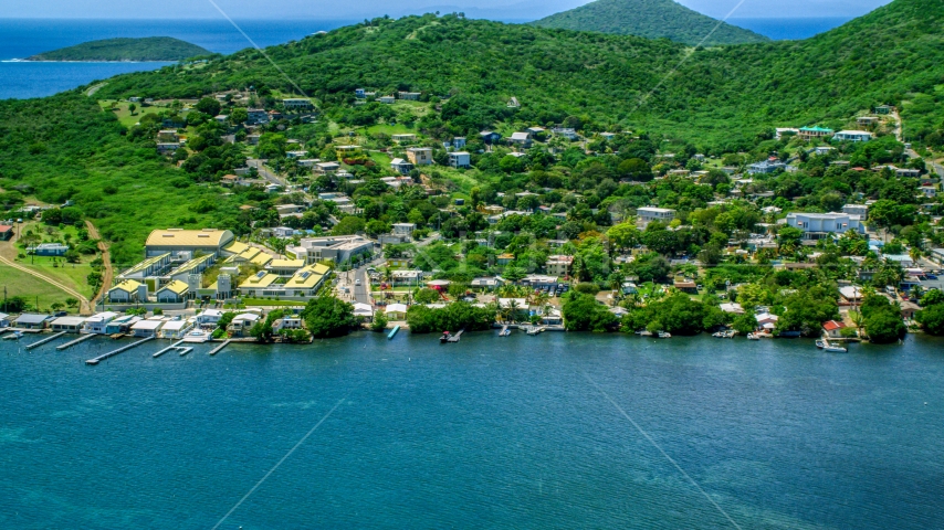 Factory and waterfront property in a small town, Culebra, Puerto Rico Aerial Stock Photo AX102_144.0000000F | Axiom Images