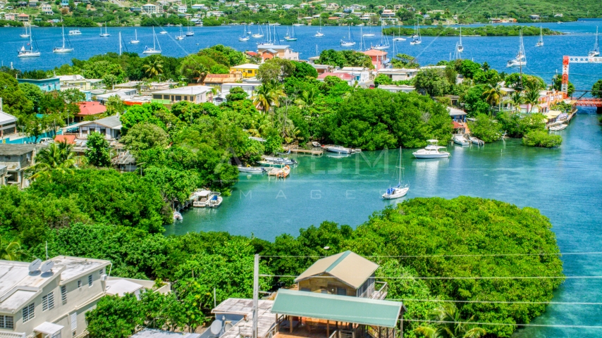 Boats in a cove at a small oceanside island town, Culebra, Puerto Rico Aerial Stock Photo AX102_151.0000000F | Axiom Images
