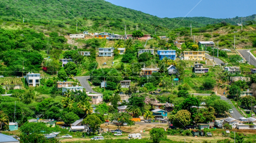 Residential neighborhoods on a hillside, Culebra, Puerto Rico Aerial Stock Photo AX102_165.0000000F | Axiom Images