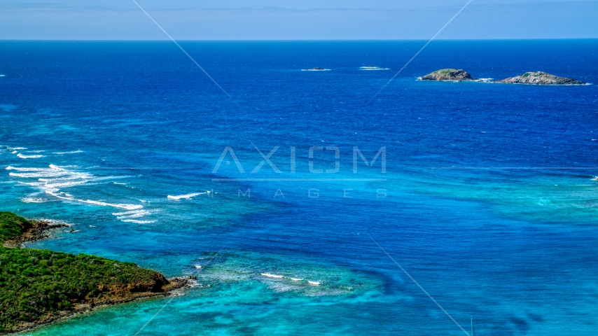 Tiny islands in sapphire blue ocean in the Caribbean, Culebrita, Puerto Rico Aerial Stock Photo AX102_179.0000133F | Axiom Images