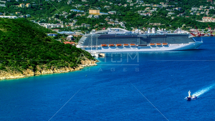 Cruise ship docked at the coastal island town of Charlotte Amalie, St. Thomas Aerial Stock Photo AX102_200.0000000F | Axiom Images