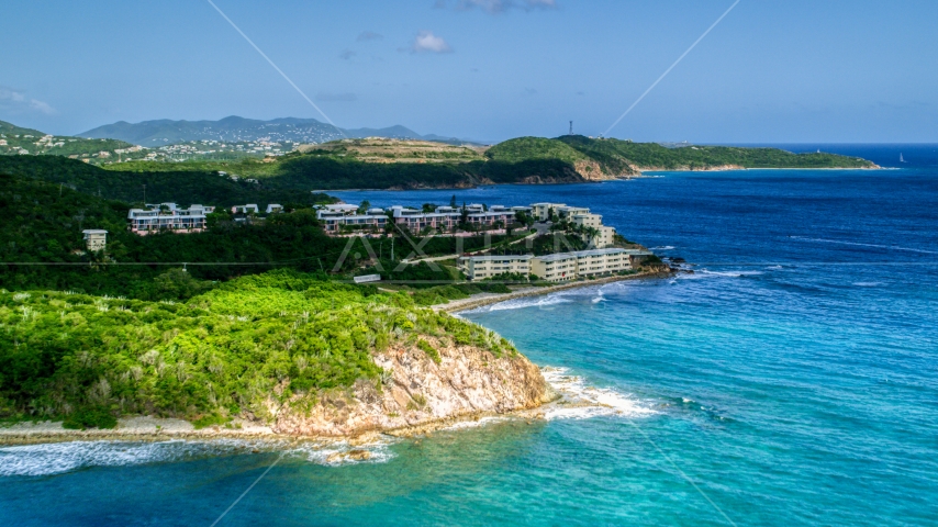 Oceanfront condominiums overlooking sapphire blue waters, Southside, St Thomas Aerial Stock Photo AX102_236.0000000F | Axiom Images