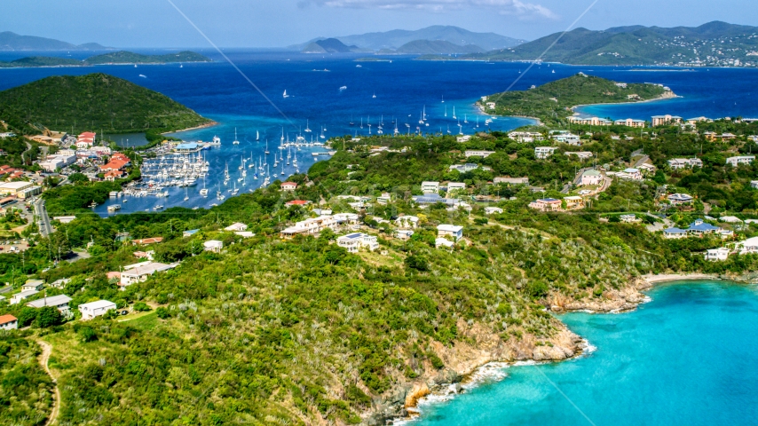 Boats and marina in Vessup Bay in Red Hook near island homes, St Thomas, the US Virgin Islands Aerial Stock Photo AX102_241.0000000F | Axiom Images