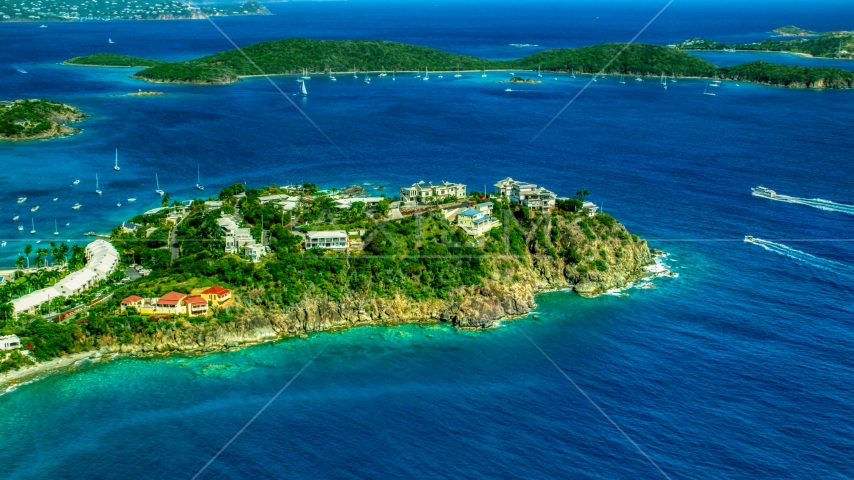 Hillside oceanfront homes overlooking sapphire blue waters, East End, St Thomas Aerial Stock Photo AX102_247.0000000F | Axiom Images