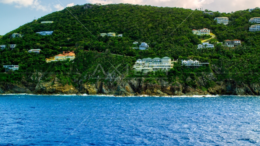 Hillside oceanfront mansions on a Caribbean island, Northside, St Thomas, the US Virgin Islands Aerial Stock Photo AX102_262.0000315F | Axiom Images