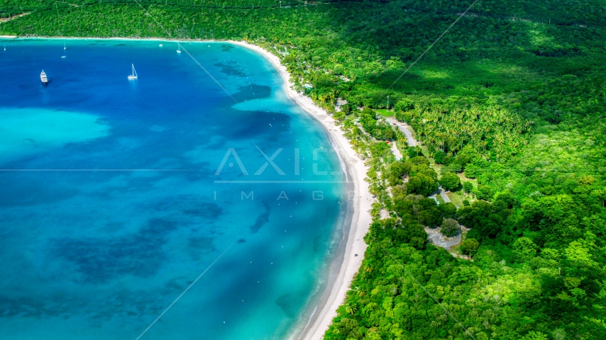White sand Caribbean island beach and turquoise blue waters, Magens Bay, St Thomas Aerial Stock Photo AX102_271.0000000F | Axiom Images