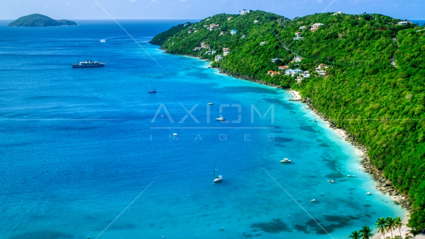 Sailboats in turquoise Caribbean waters and oceanfront island homes, Magens Bay, St Thomas Aerial Stock Photo AX102_273.0000182F | Axiom Images