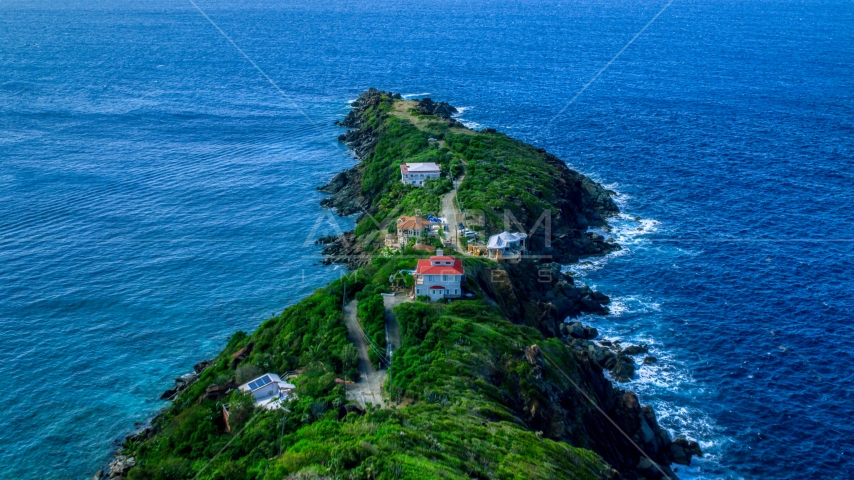 Upscale hilltop homes on a Caribbean island, Magens Bay, St Thomas Aerial Stock Photo AX102_277.0000000F | Axiom Images