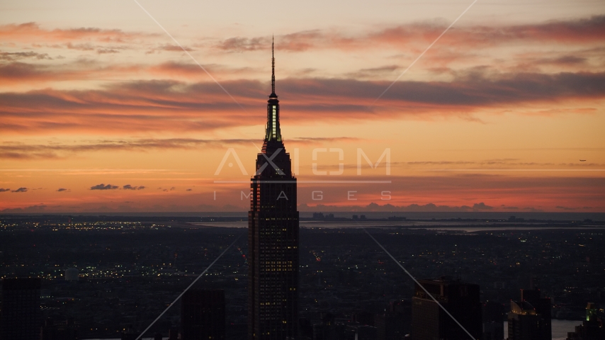 Empire State Building at sunrise in Midtown Manhattan, New York City Aerial Stock Photos AX118_007.0000000F | Axiom Images