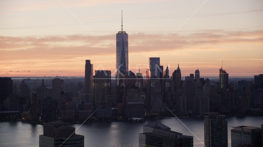 World Trade Center skyline across Hudson River at sunrise in Lower Manhattan, New York City Aerial Stock Photos AX118_030.0000060F