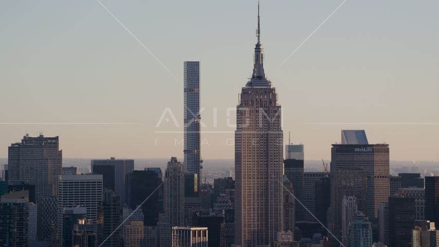 Empire State Building and 432 Park Avenue at sunrise in Midtown Manhattan, New York City Aerial Stock Photos AX118_166.0000205F