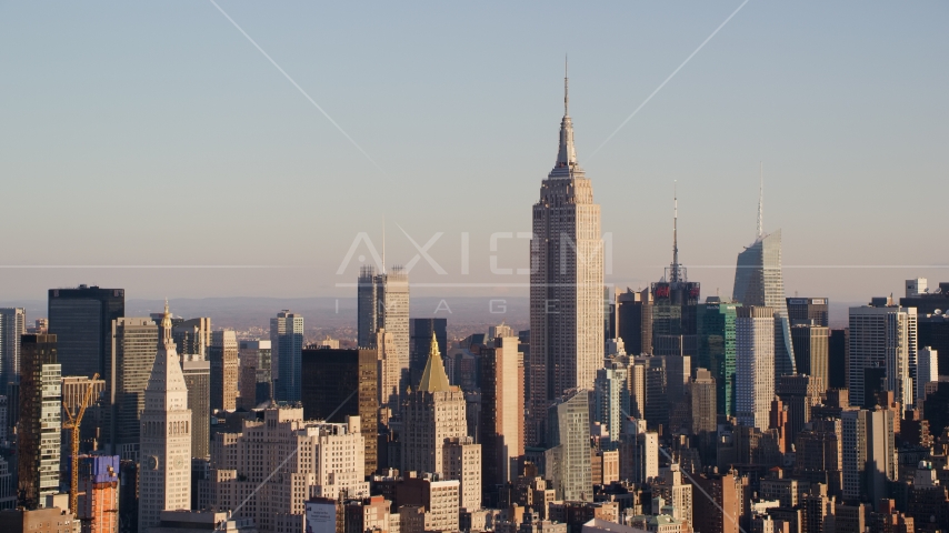 Empire State Building and Midtown high-rises at sunrise in New York City Aerial Stock Photos AX118_176.0000000F