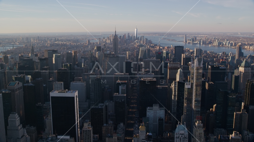 Midtown Manhattan skyscrapers at sunrise in New York City Aerial Stock Photos AX118_197.0000231F | Axiom Images