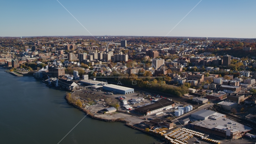 Riverfront warehouse buildings near downtown Yonkers, New York in Autumn Aerial Stock Photos AX119_063.0000143F