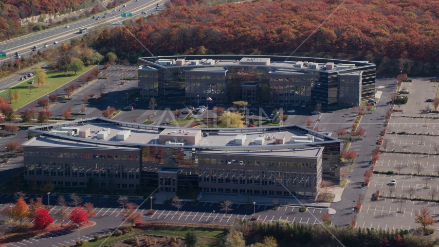 A pair of office buildings in Autumn, Melville, New York Aerial Stock Photo AX119_251.0000081F | Axiom Images
