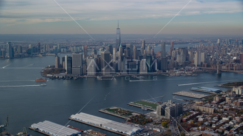 Lower Manhattan skyscrapers and the East River in Autumn, New York City Aerial Stock Photos AX120_089.0000292F