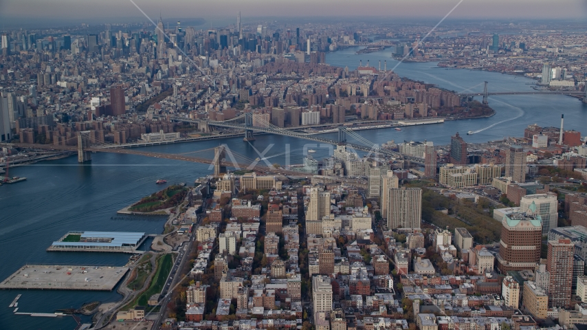 The Brooklyn and Manhattan Bridges spanning the East River in Autumn, New York City Aerial Stock Photos AX120_091.0000087F | Axiom Images