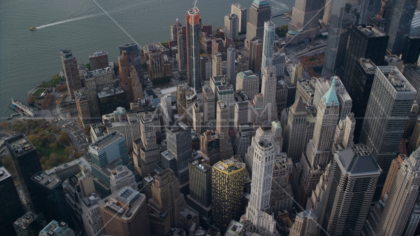 A view of Lower Manhattan skyscrapers and high-rise buildings in Autumn, New York City Aerial Stock Photos AX120_097.0000283F