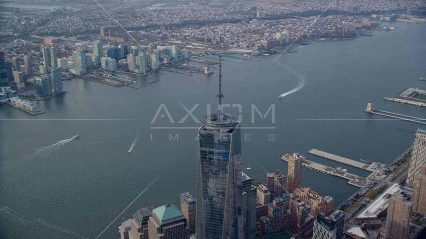 Top of One World Trade Center and the Hudson River in Lower Manhattan, New York City Aerial Stock Photo AX120_101.0000037F | Axiom Images