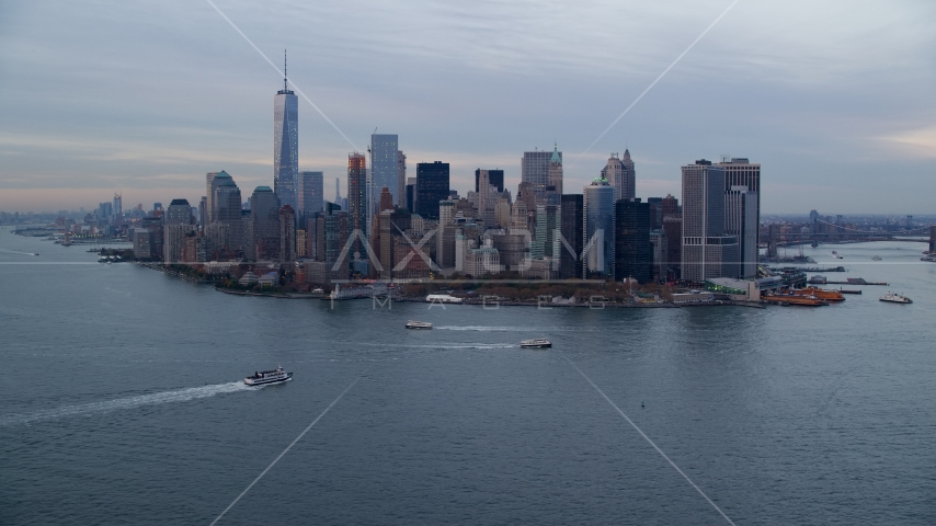 Battery Park and Lower Manhattan skyscrapers at sunset, New York City Aerial Stock Photos AX121_017.0000261F