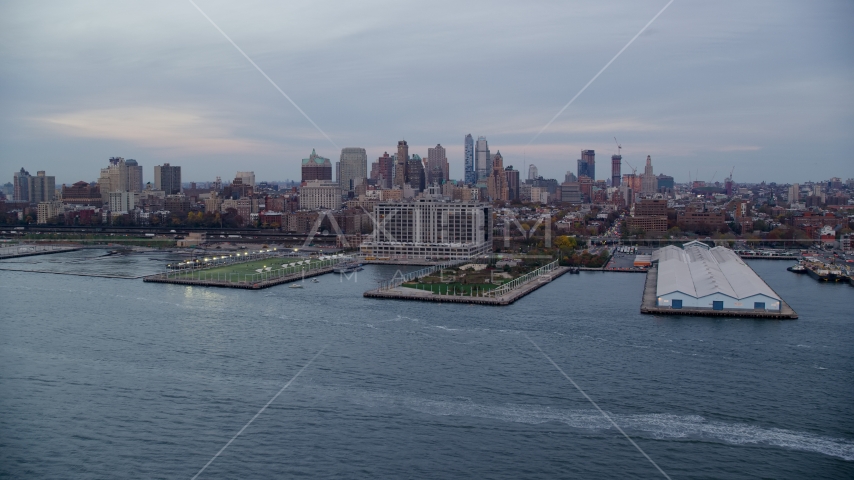 Piers 5 and 6 and Brooklyn skyline at sunset in New York City Aerial Stock Photos AX121_020.0000174F