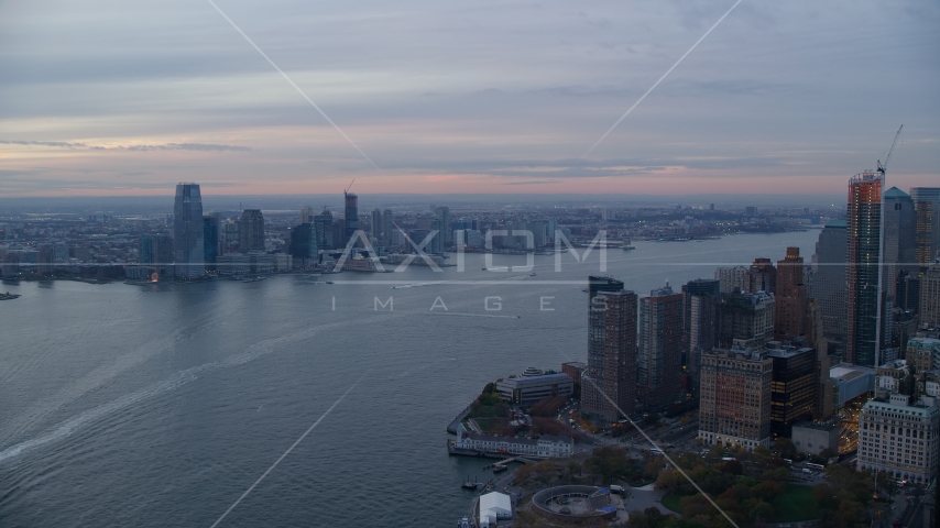 Downtown Jersey City, New Jersey at sunset seen across the Hudson River Aerial Stock Photos AX121_035.0000185F