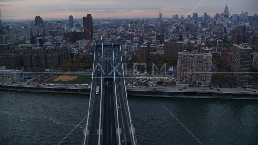 Light traffic on the Manhattan Bridge at sunset in New York City Aerial Stock Photos AX121_041.0000083F