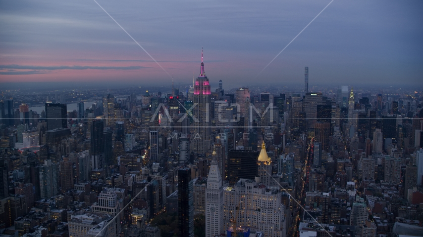 The Empire State Building and Midtown high-rises at sunset in New York City Aerial Stock Photos AX121_081.0000054F