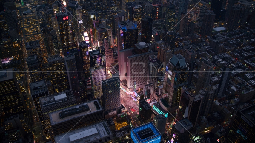 Bright lights of Times Square at sunset in Midtown Manhattan, New York City Aerial Stock Photos AX121_105.0000077F
