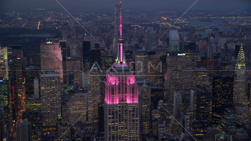 The top half of Empire State Building at sunset in Midtown, New York City Aerial Stock Photos AX121_110.0000032F | Axiom Images