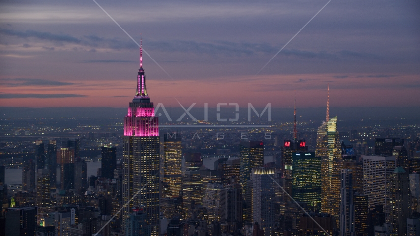 The Empire State Building at sunset in Midtown, New York City Aerial Stock Photos AX121_113.0000009F
