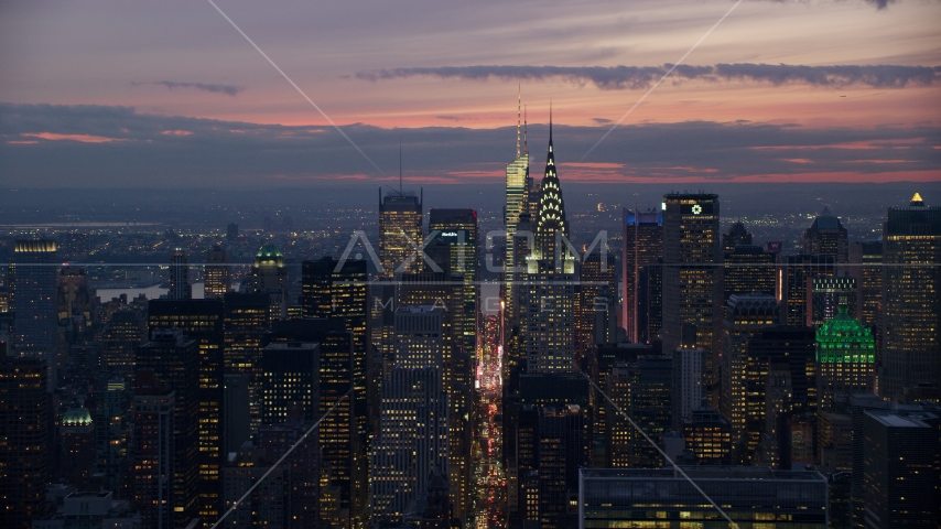 Chrysler Building in front of Midtown skyscrapers at sunset, New York City Aerial Stock Photos AX121_116.0000185F