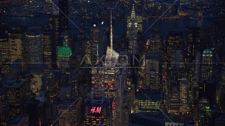 Top of Bank of America Tower in Midtown at night in New York City Aerial Stock Photos AX121_132.0000030F