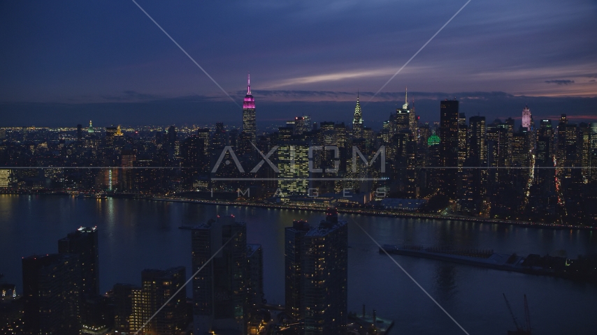 The UN Building and Midtown seen from Queens at night in New York City Aerial Stock Photos AX121_143.0000082F