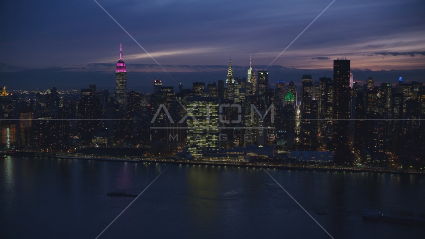 The UN Building in Midtown Manhattan at night, New York City Aerial Stock Photos AX121_144.0000246F